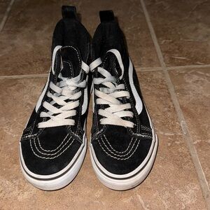 Black and White VANS. Good condition.